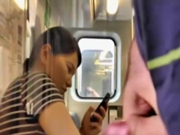 Stroking his small penis on the train