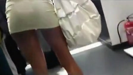 Fashionable girl shops in slutty dress as I film her ass