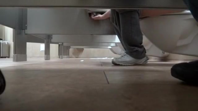 Foot fetish cam in the public lavatory