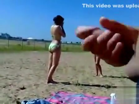 German pervert jerks off to women on topless beach