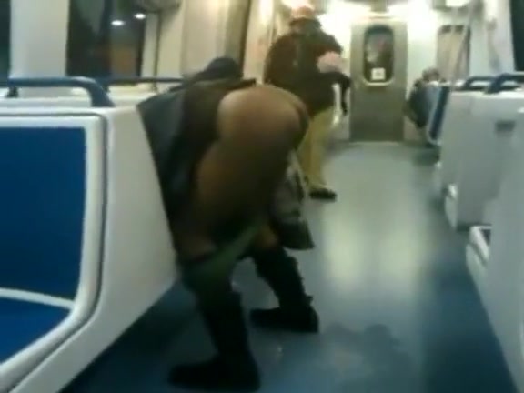 Black bag woman takes a piss on the subway