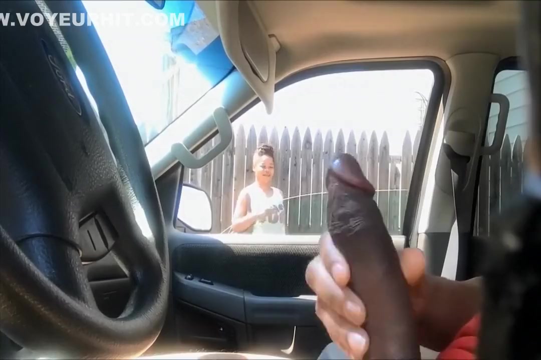Cute black hooker checks out his stroking in the car