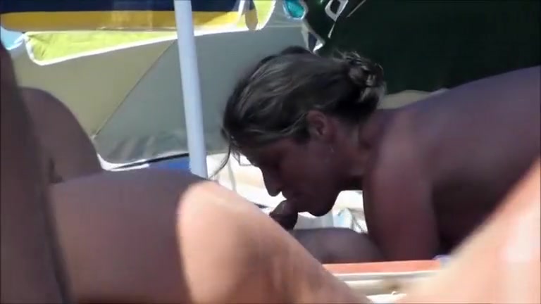 Bold public blowjobs on the beach from sexy wives