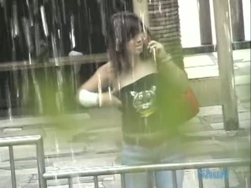 A sexy sharking asian girls nipple peek of  in public