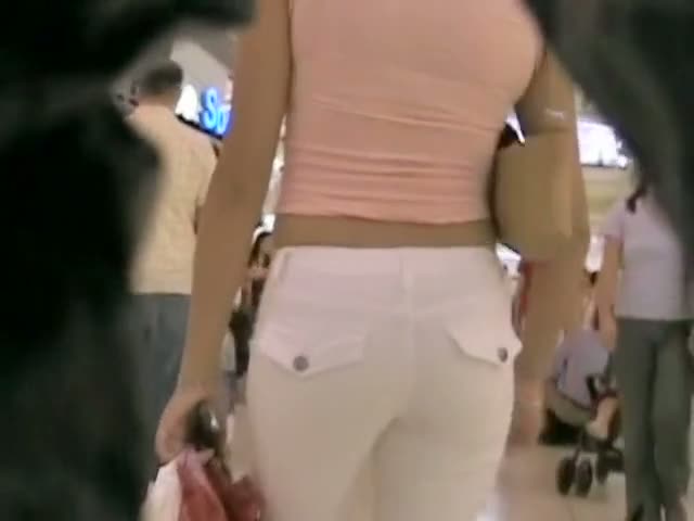 Perky asses of girls in white jeans candid camera clip
