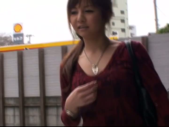 Titties of an asian babe caught down blouse by a street cam