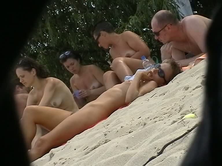 four naked beauties on the beach mucking about bollock naked