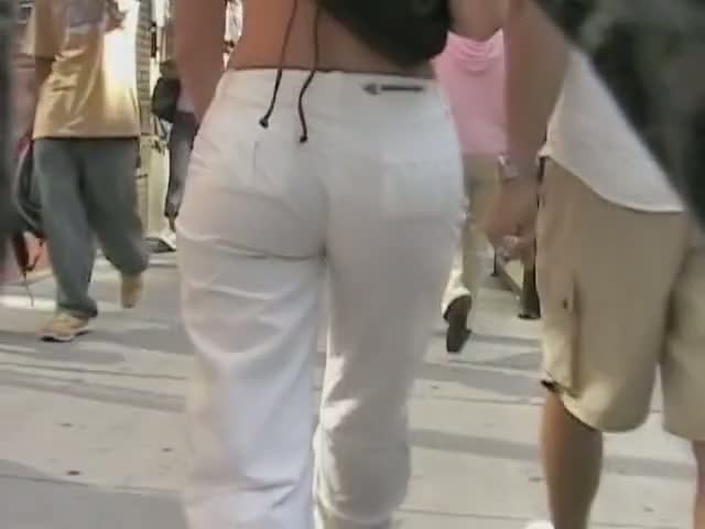 Gorgeous round ass in semi-transparent pants