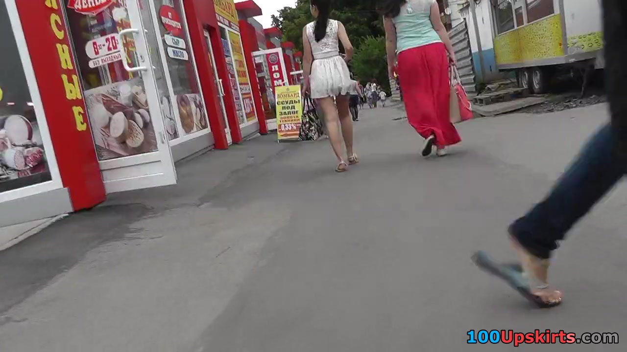 Girl walks with her gf in the amateur upskirt scene