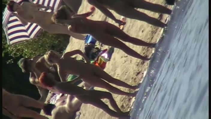 Nude beach filled with hot babes and an unsuspicious voyeur