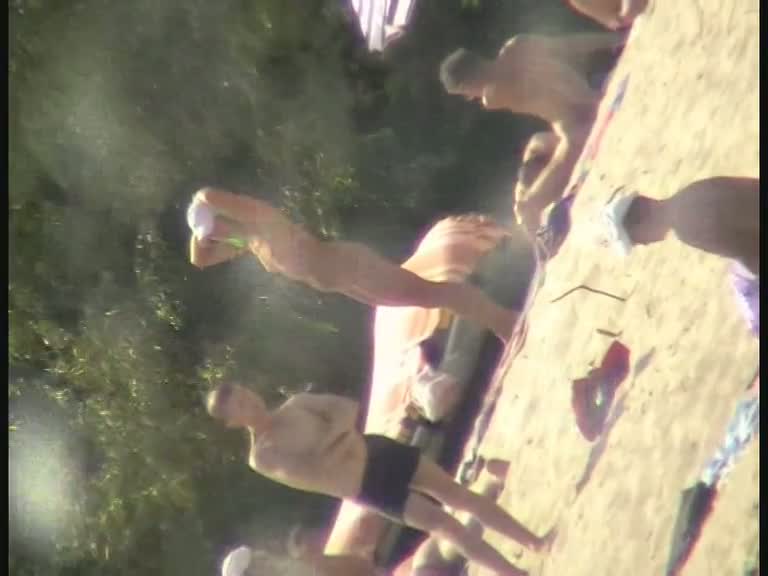 Nude beach voyeur film making extravaganza with hoes on the phone