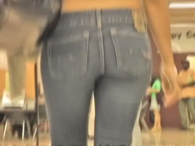 Tight ass in jeans woman showing her curves for the voyeur camera