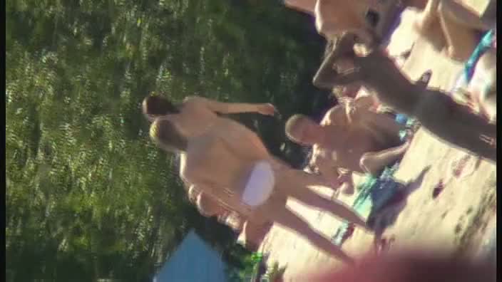 Nude beach voyeur shoots a hot babe with a hidden cam