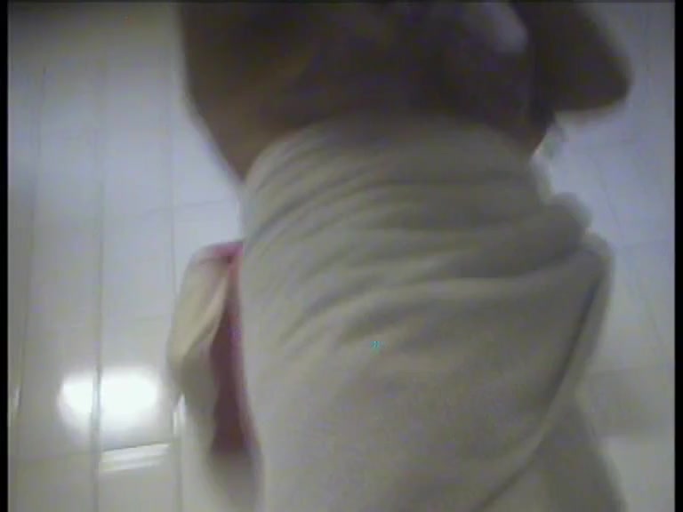Female amateur got nude boobs spied after shower on spy cam