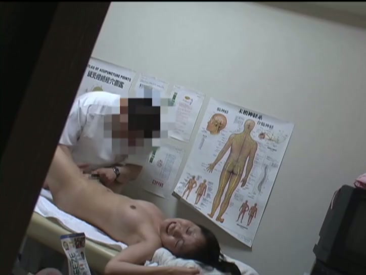 An Asian girl receives some good massage and pussy fingering in this medical voyeur tube