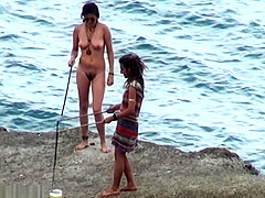 Candid naked nudist teenager booty on the public beach