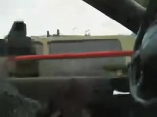 Lewd man sitting at the wheel and showing the piston