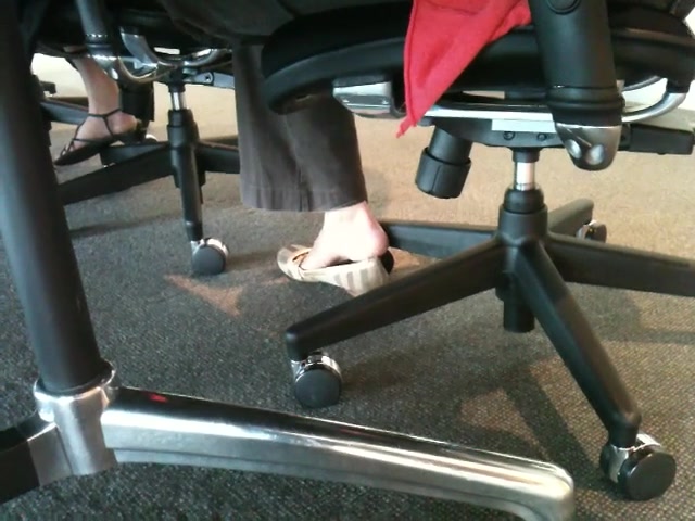 Shoe teasing below the desks...
