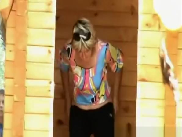 Women peeing wooden cabin