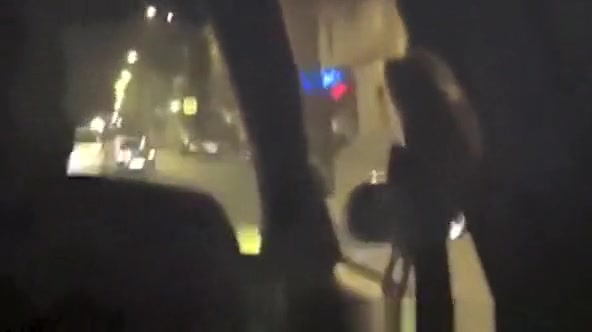 Drunk exhibitionist goes topless in the car