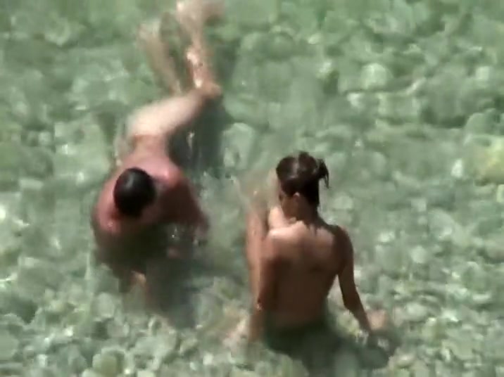 Hot teen girls cover friend with sand