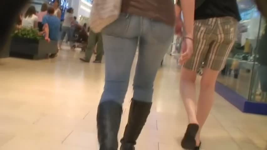 Sexy asses in tight jeans walking around clip by candid cam
