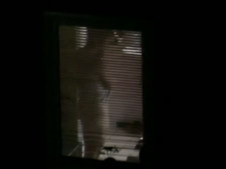 Nude candid female with a big sexy ass filmed through a window